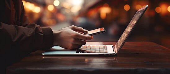 Canvas Print - Hand typing on a smartphone with copy space for text multitasking with online shopping emailing and playing on the phone