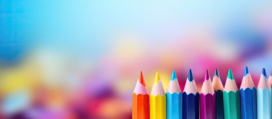 Fototapete - A color pencil rests on a vibrant background creating a captivating copy space image
