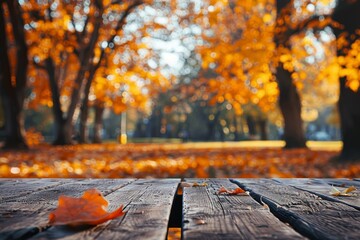 Wall Mural - Empty wooden table with blurred autumn backdrop Energetic picture