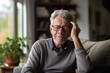 © Denis - a 60 year old man with dementia, stress , headache  at home