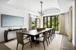 © Wirestock - Spacious dining room with a sophisticated, classic design
