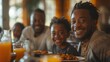 © arti om - Three generations of a Black family gather around a dining table, sharing a meal and laughter as they celebrate the love and resilience that has bound them together through the years