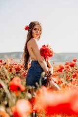 Canvas Print - Woman poppies field. portrait happy woman with long hair in a poppy field and enjoying the beauty of nature in a warm summer day.