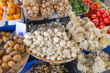 Wall Mural - Variety of Edible Mushrooms at Farmers Market Stall