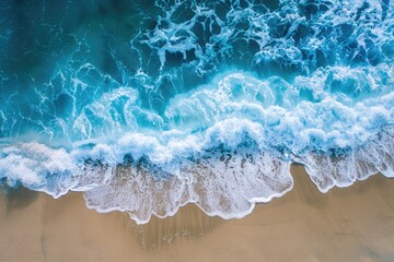 Wall Mural - Ocean Wave Sand. Aerial View of Beach with Blue Ocean Waves and Sandy Shoreline