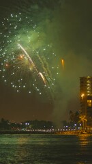 Wall Mural - Firework on Honolulu Oahu Hawaii at Waikiki beach at night vertical video 