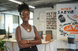 © AI_images - A Black entrepreneur, standing in a modern office space adorned with motivational quotes, passionately pitching her groundbreaking startup idea to potential investors, radiating determination and