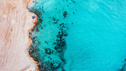 Wall Mural - Aerial view of beautiful Nissi beach in Ayia Napa, Cyprus. Nissi beach in Ayia Napa famous tourist beach in Cyprus. A view of a azzure water and Nissi beach in Aiya Napa, Cyprus.