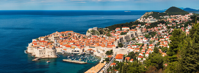 Wall Mural - Dubrovnik a city in southern Croatia fronting the Adriatic Sea, Europe. Old city center of famous town Dubrovnik, Croatia. Picturesque view on Dubrovnik old town (medieval Ragusa) and Dalmatian Coast.