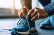 © Andrii  - Elderly Person Tying Running Shoe Laces