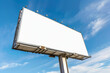 © forenna - A blank poster empty white billboard set against the blue sky. The large rectangular billboard gives room for creative advertising ideas. It's placed outdoors at an angle that capt