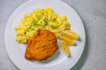 Wall Mural - Chicken cutlet with couscous and lemon