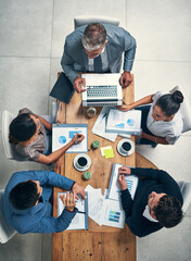 Poster - Top view, business people or finance staff in meeting with laptop, documents or annual report in office. Collaboration, employees and ceo with financial review, info and graphs or charts for planning