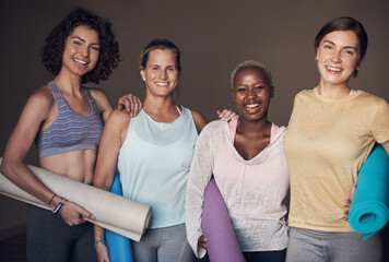 Wall Mural - Woman, group and portrait of friends in yoga class, activewear and smile for fitness in wellness centre. Workout, mat and training in studio for flexibility, pilates and health and holistic hobby