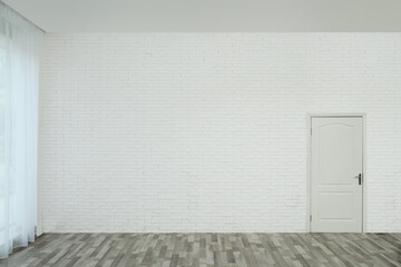 Poster - Empty room with brick wall, white door and laminated floor