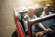 © peopleimages.com - Senior, couple and driving convertible for road trip holiday or countryside retirement, transportation or travel. Man, woman and old people on vacation journey in California, explore or happiness