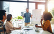© peopleimages.com - Meeting, presentation and whiteboard with business man speaking to staff in boardroom of office. Coaching, training and workshop with employee talking to team in workplace for development or growth