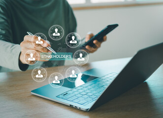 stakeholders concept. person touching stakeholders icon on virtual screen for business finance stake