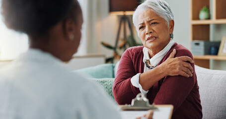 Canvas Print - Senior, woman and doctor with consultation for shoulder pain with injury, explaining symptoms and medical checklist. Elderly patient, nurse and discussion in nursing home, osteoporosis and rear view