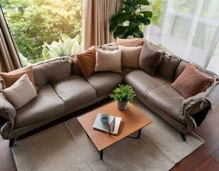 Top view of a cozy living room with a sectional sofa and modern furniture, with a natural light background, concept of home interior.