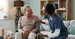 © peopleimages.com - Nurse, old man and wheelchair for medical support, wellness and person with disability. People, healthcare worker and patient with service or help with happiness, talking or discussion for advice