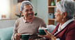 © peopleimages.com - Living room, relax and elderly couple with coffee for love, bonding and funny conversation. Senior people, smile and happy with drink for morning discussion, communication and peace in retirement