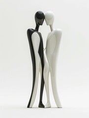 A black and white sculpture of two figures, one dark and one light, embracing. The figures are stylized and have smooth, flowing lines. The sculpture is mounted on a white base.