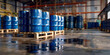 © JP - Blue barrel drum on the pallets contain liquid chemical in warehouse prepare for delivery to customs, Rows of blue industrial drums stored in a warehouse, symbolizing mass storage and logistics.