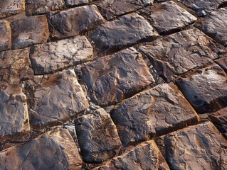 Macro detail of gray and black stone walkway. Natural paving concept