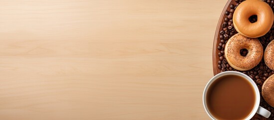 Poster - A top down view of a table with a coffee cup a donut and empty space for your text. Creative banner. Copyspace image