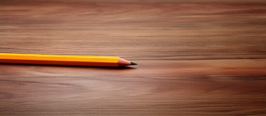 Aufkleber - An isolated image of a crayon wax pencil on a wooden surface with copy space