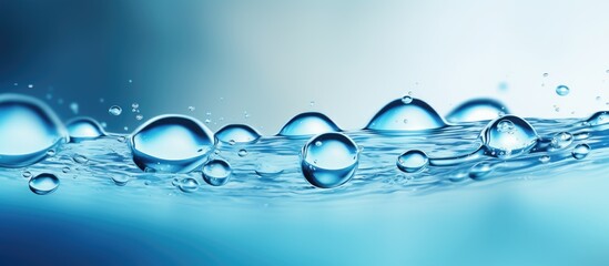 Poster - A refreshing image of clear blue water droplets. Creative banner. Copyspace image