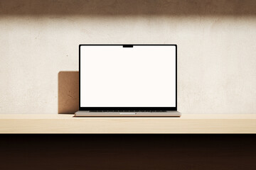 Wall Mural - apple macbook pro on the wooden desk on a plaster background