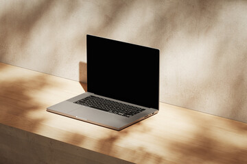 Wall Mural - apple macbook pro on the wooden desk on a plaster background