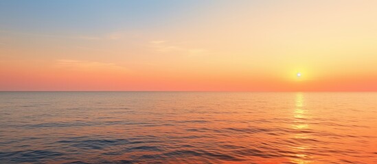 Poster - A tranquil evening seascape with an orange sea horizon offering a serene and peaceful sea view Perfect as a copy space image