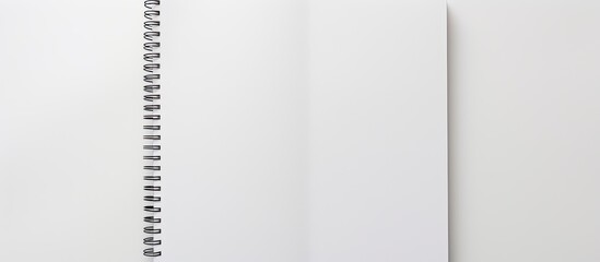 Poster - A copy space image of a blank paper notebook or notepad on a white background