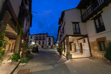 Wall Mural - Village and medieval house in Covarrubias in northern Spain at night. Burgos