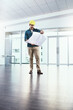 © peopleimages.com - Architecture, man and reading blueprint for design, safety and floor plan with upgrade for development as project management. Male engineer, paper and construction worker for sketch of renovation