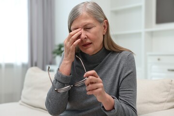 Poster - Overwhelmed woman with glasses suffering at home