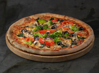 Wall Mural - Pizza with ham, mozzarella, black olives, mushrooms, red pepper and broccoli