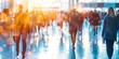 © Vladyslav  Andrukhiv - Business people walking at business center or station, or busy trade fair. Blurred colorful image. Wide banner with copy space