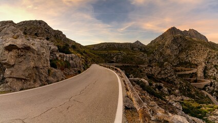 Wall Mural - view of the famous snake road leading from the Coll de Reis mountain pass to Sa Calobra in the rugged landscape of northern Mallorca