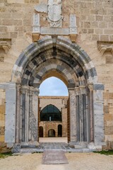 Wall Mural - view of the entrance gate to the Maniace Castle on Isola di Ortigia in Siracusa