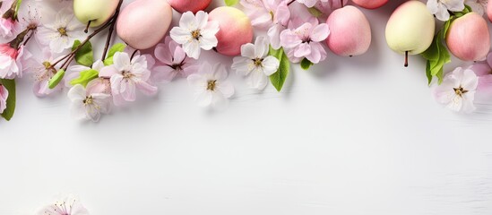 Aufkleber - Easter decoration Pink and white flowers apple tree with Easter eggs with space for text on a light background Top view flat lay. copy space available