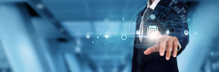 Wall Mural - web development: businessman touching the web development icon and global technological networking. 