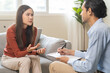 © KMPZZZ - Psychology, depression. Suffer asian young woman consultation with psychologist while patient counseling mental therapy, doctor hand taking notes at clinic. Psychologist with sick mental health person