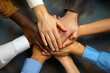 © DilSpace - A circle of hands from office colleagues, demonstrating the effectiveness of teamwork and collaboration in achieving goals in the office environment.