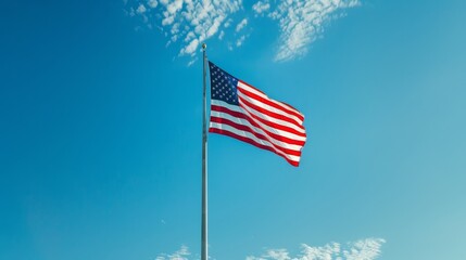 American flag against the blue sky