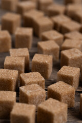 Cubes of refined cane sugar in closeup.