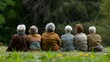 © Atmospheric stock - diverse old group sitting on lawn